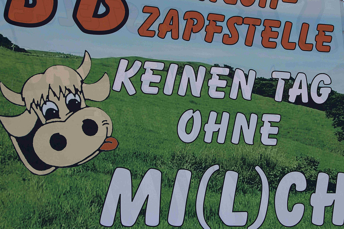 Werbeplakat für eine Milch-Zapfstelle